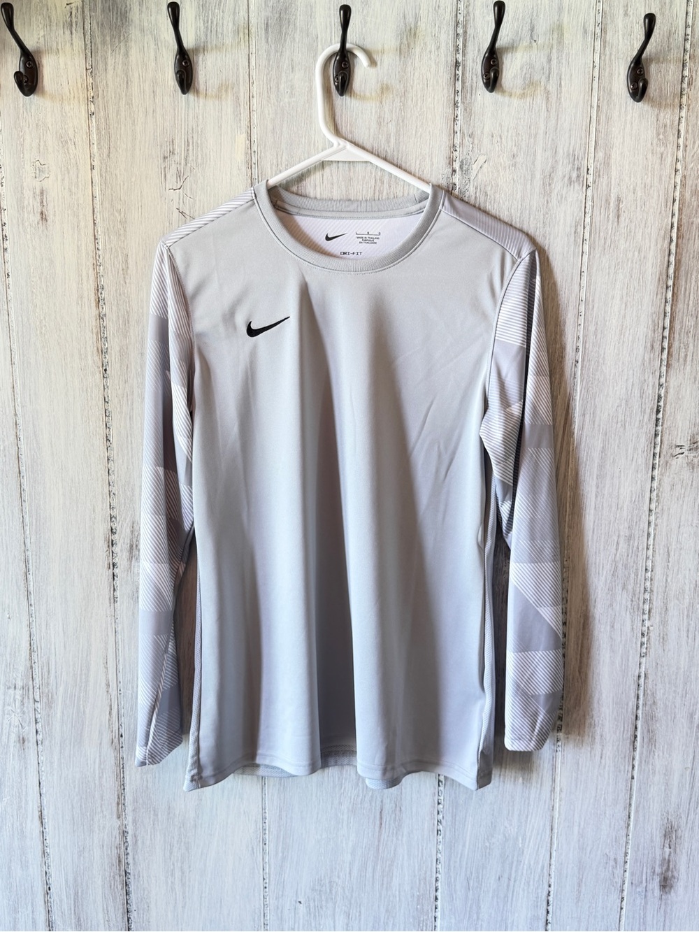 Nike Light Gray Long Sleeve Performance Top with Black Swoosh NWOT